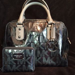 Authentic Michael Kors nickel mirror metallic