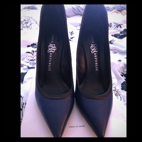 Navy blue and black high back pointy toe heels