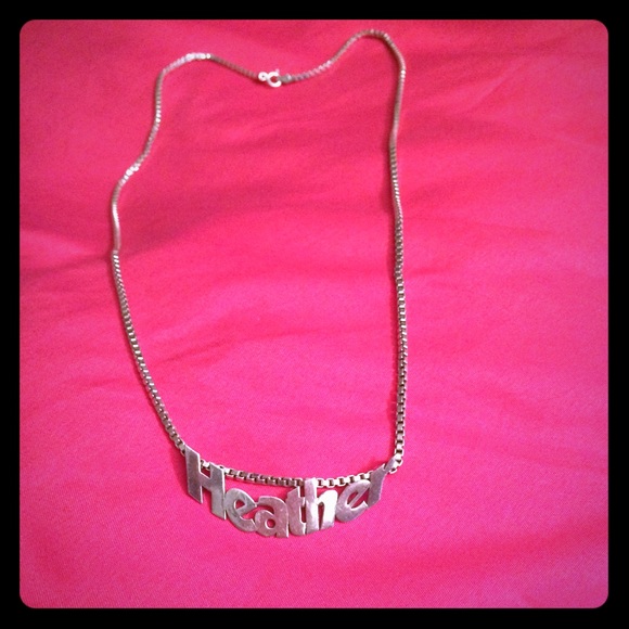 Pre-owed sterling silver name tag necklace .