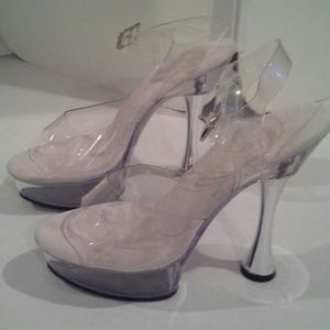 Clear sandals with metallic heels