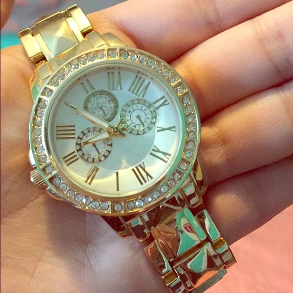 Charlotte Russ gold watch