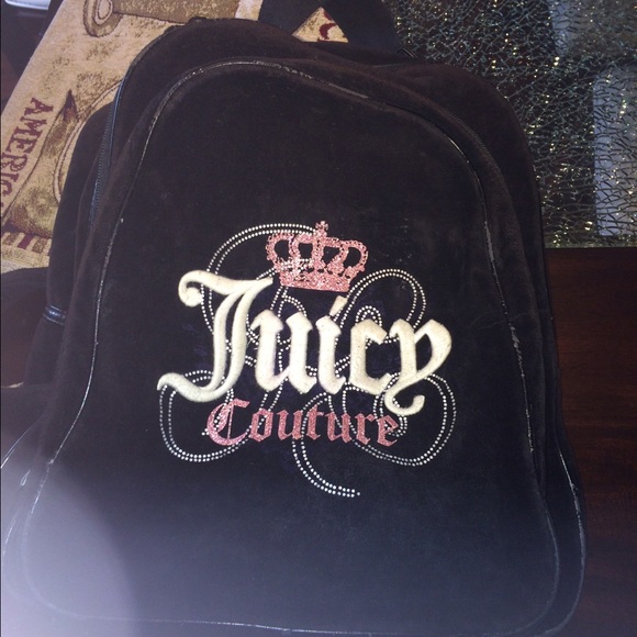 Juicy couture black leather backpack.