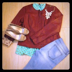 Collarless faux leather red jacket