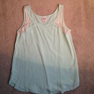 Cute pastel blue top with lace accents