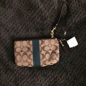 Brand new authentic coach wristlet.