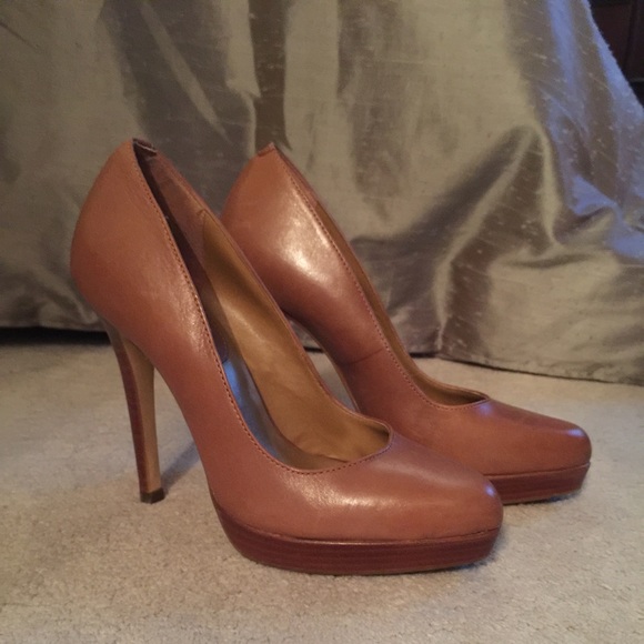 Nude/tan Aldo platform pumps