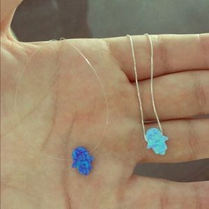 -Hamsa with rubber chain (left).