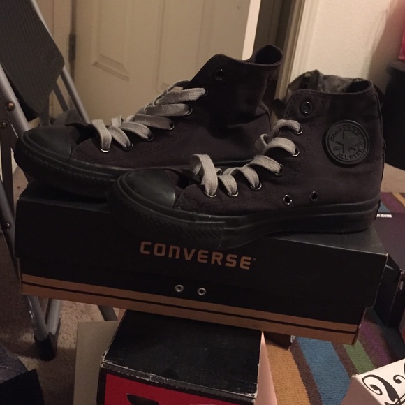 All black Converse chucks high tops