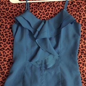 Blue ruffled blouse