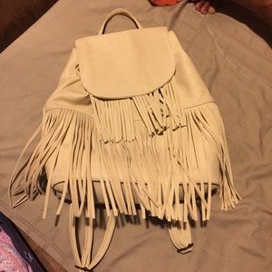 Cream color fringe backpack