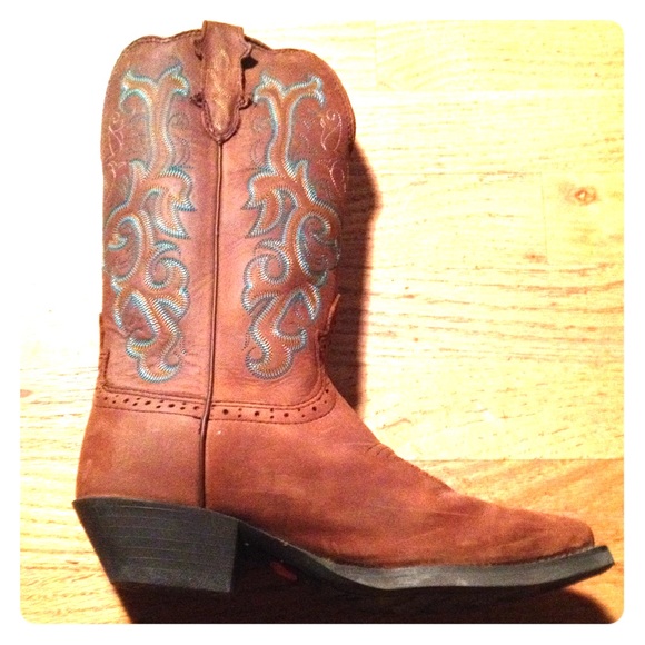Brown cowboy boots with blue stitched design
