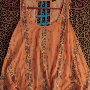 Orange flowy tank w cut out back