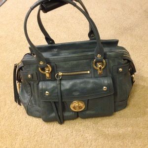 Women blue Coach handbag