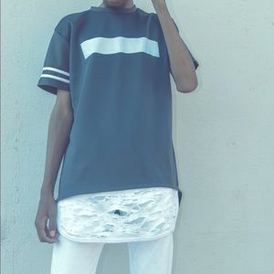 One of one hand designed MarlyTee.