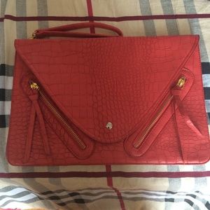 Large red scaled clutch