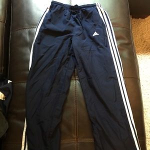 Two Adidas sweatpants.