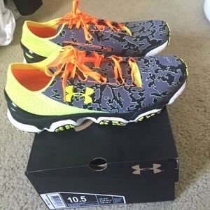 Like new pair of Under Armour XC shoes