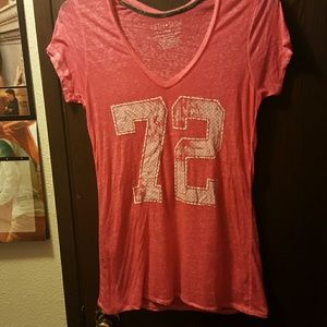 bright pink light weight jersey type top.