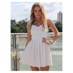Beautiful White Pleated Dress with Heart Cutout