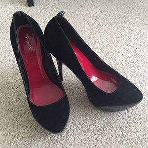 Simple black high heels