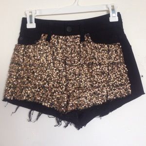 Black and gold high waisted shorts