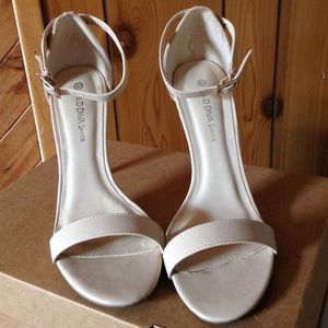 Nude strappy heels