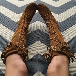 Minnetonka lace up fringe boots