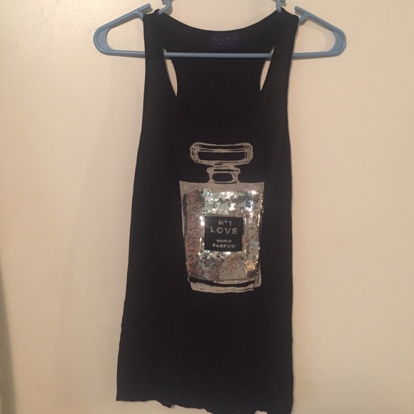 Black tank top with sequin perfume bottle.