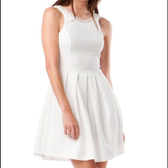 Moon Light Dresses & Skirts - White pearl neck party dress from Francesca.