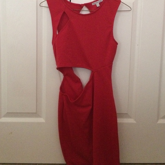 Red Bodycon Dress with many cutouts.