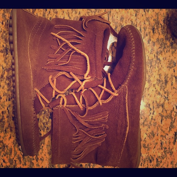 Minnetonka fringe lace up booties