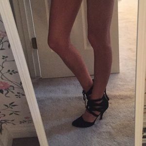Isola size 7 black heels.