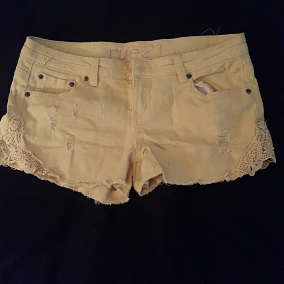 Yellow cut off shorts