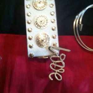 Gold and white snap bracelet, gold love ring an