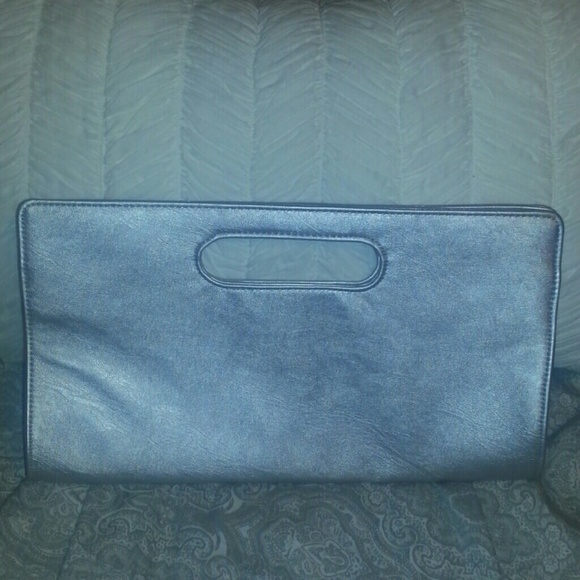 Brand new silver express clutch