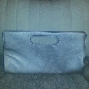 Brand new silver express clutch