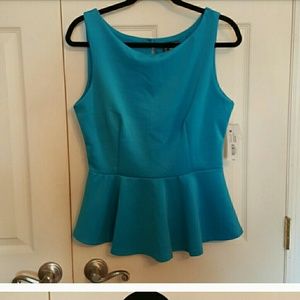 Two Peplum tops.