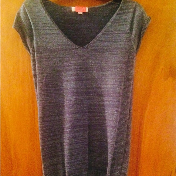 Long glitzy sweater. Cute w/ black slacks or jeans