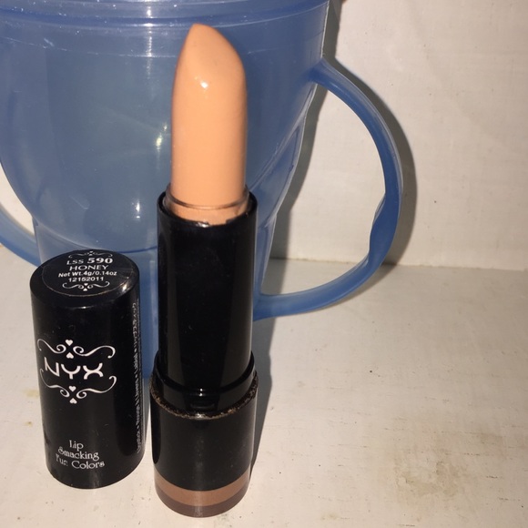 Light colored box lipstick . Used once or twice .
