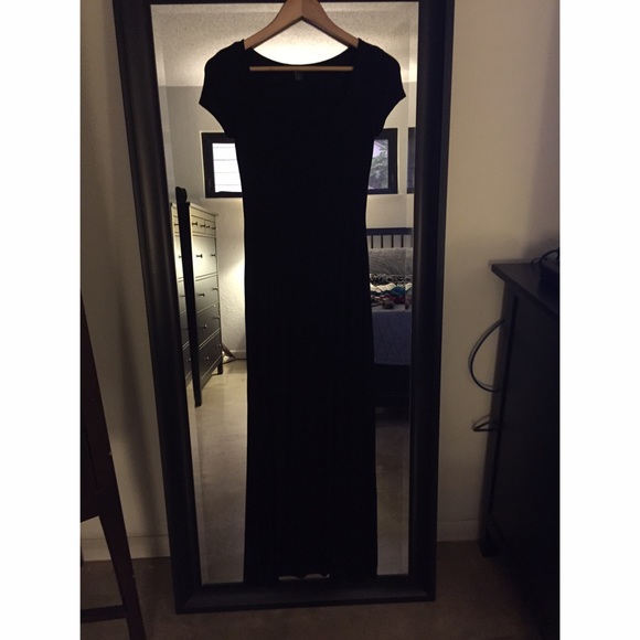 Long black body con maxi dress with slit.