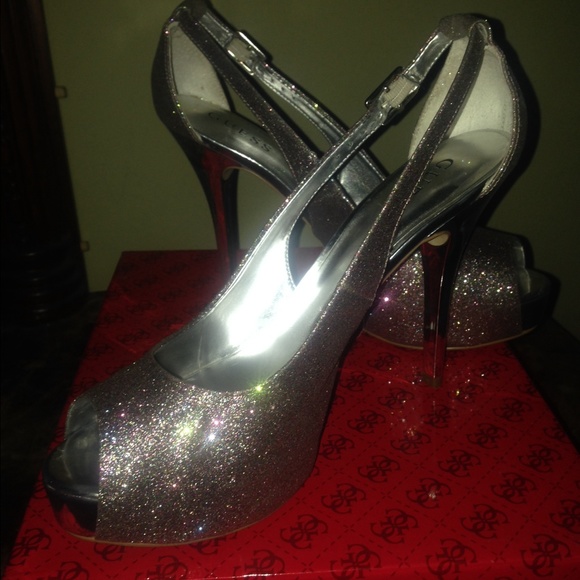 Peep toe silver pumps