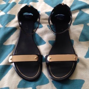 Black and gold sandals
