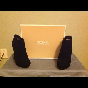Brand new never worn Michael Kors suede booties.
