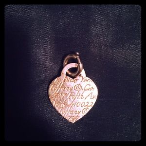Authentic Tiffany Notes Heart Tag Charm.