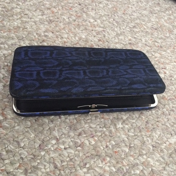 Blue and black snake skin clutch
