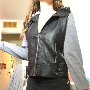 Leather jacket with sweatshirt sleeves