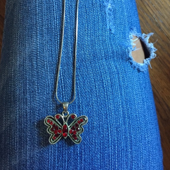 Red diamond butterfly necklace/ worn once.