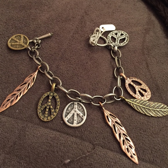 Peace sign and leather bracelet