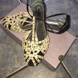 Elegant JLo closed toe sandals.