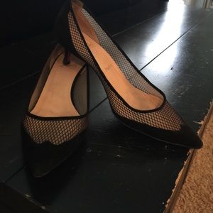 Sexy black fishnet  kitten heel.